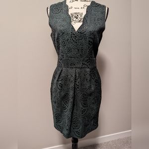 NWOT size 6 green and black dress with pockets.